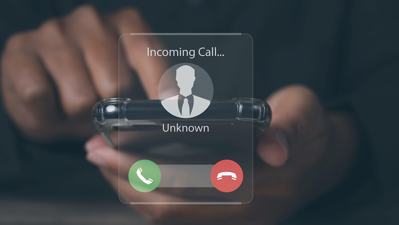 Man answering to incoming from an unknown caller. Phone call fro