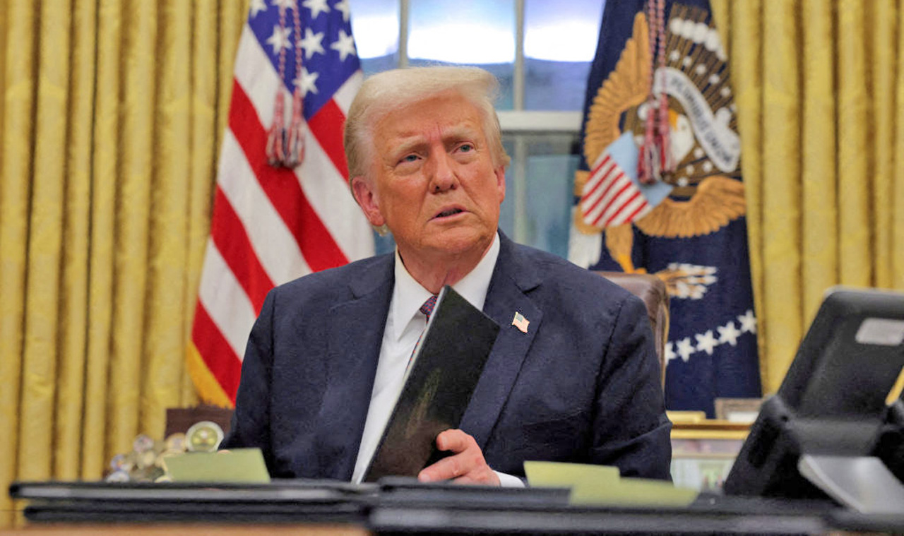 FILE PHOTO: U.S. President Donald Trump at the Oval Office in Washington