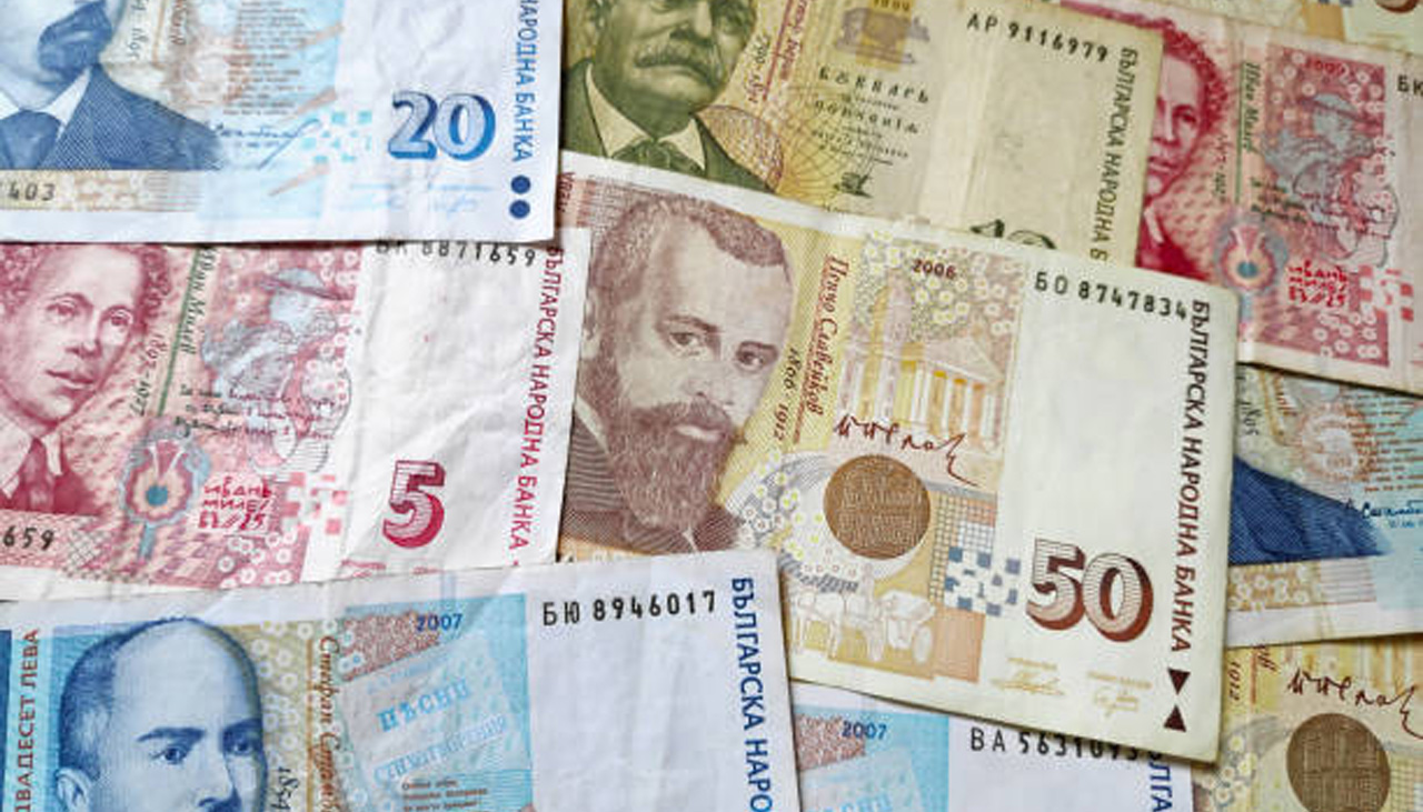 Stack of Bulgarian Lev banknotes as background.