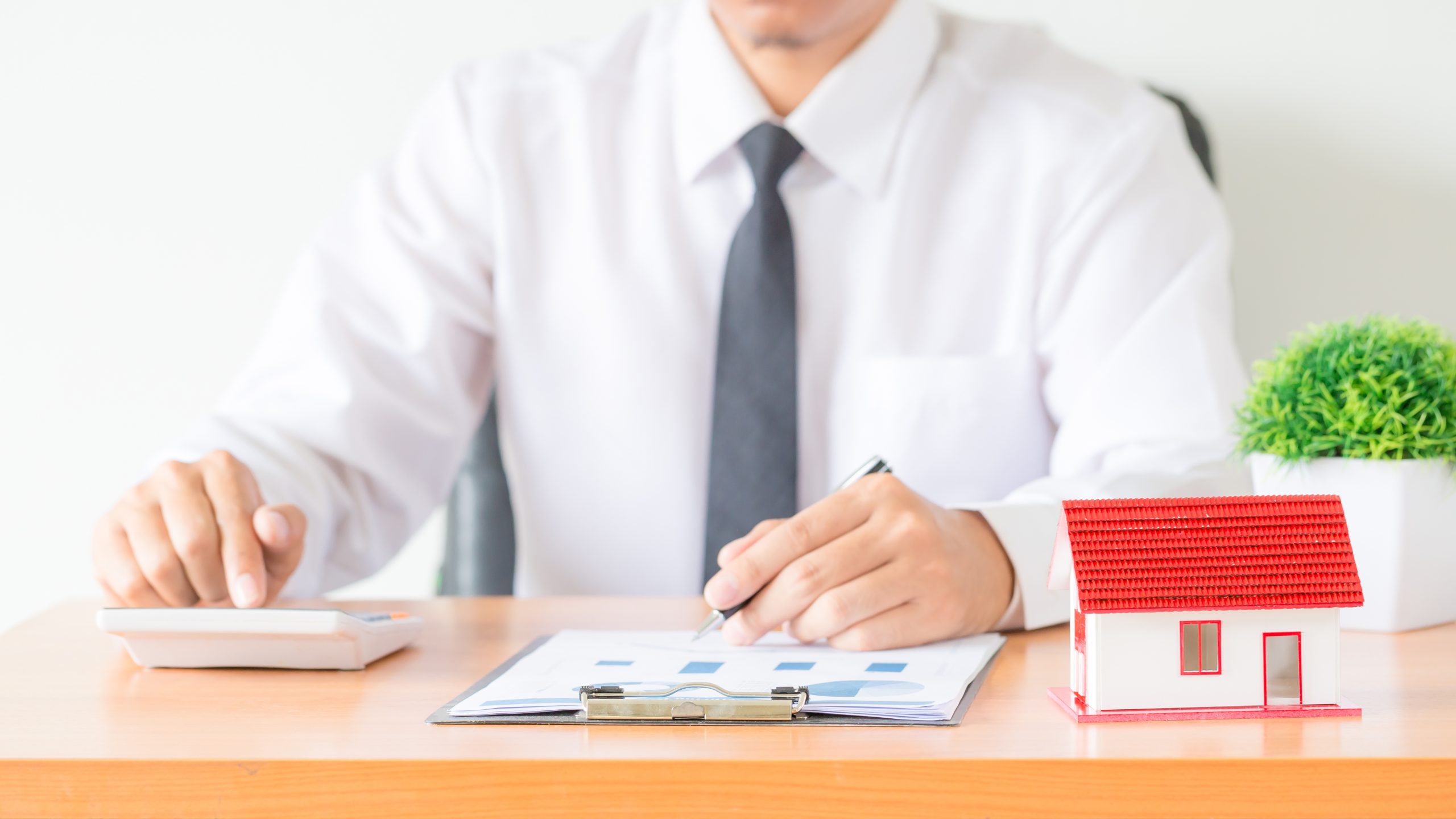 Businessman or lawyer accountant working financial investment on